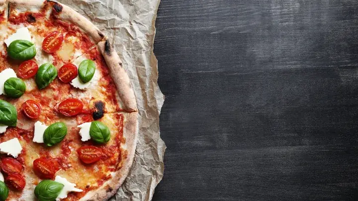 Zdjęcie pizzy z oficjalnej strony pizzerii Sztos